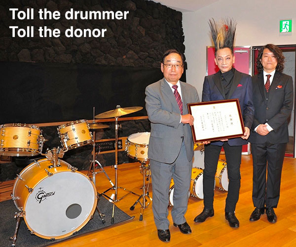Toll donates drums